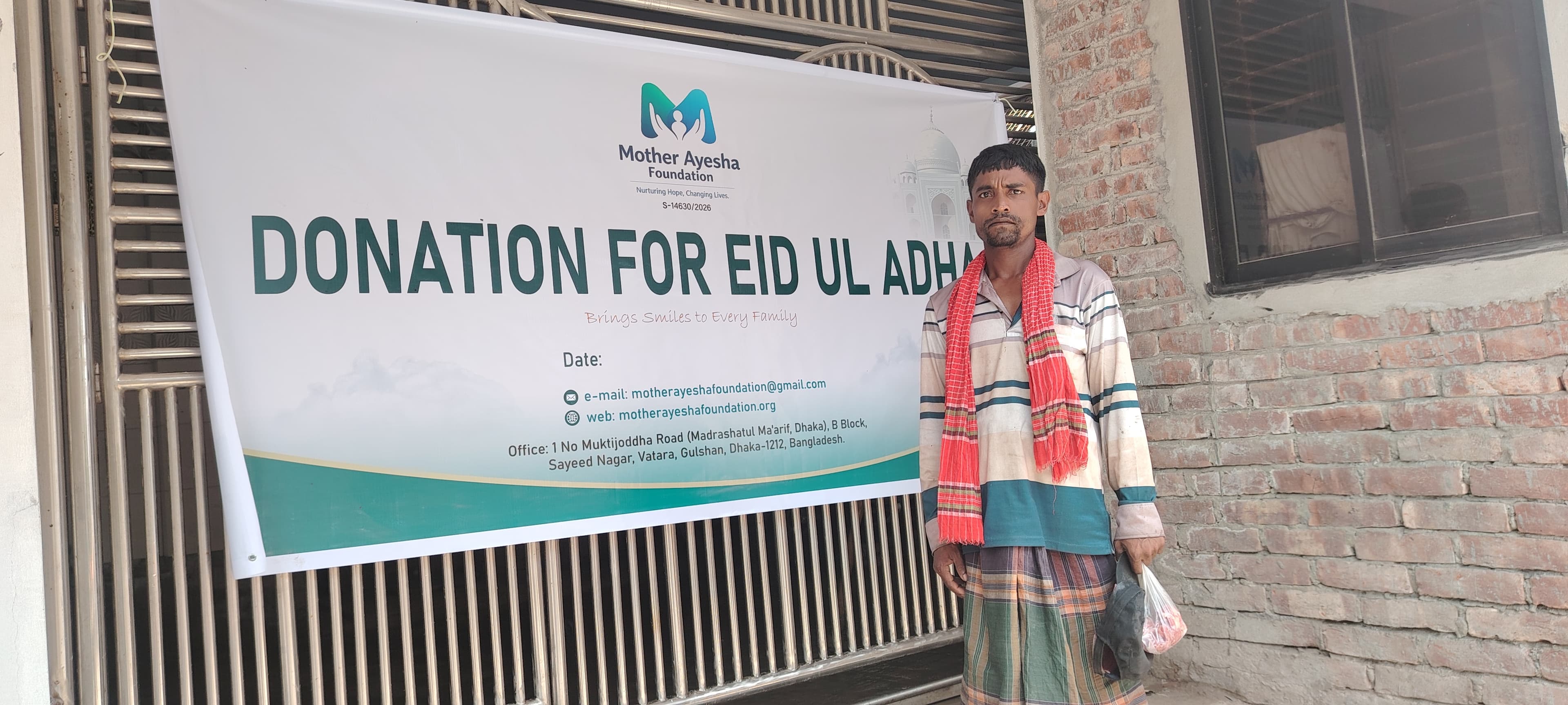 A beneficiary receiving sacrificial meat from Mother Ayesha Foundation's Eid-ul-Adha meat distribution initiative.