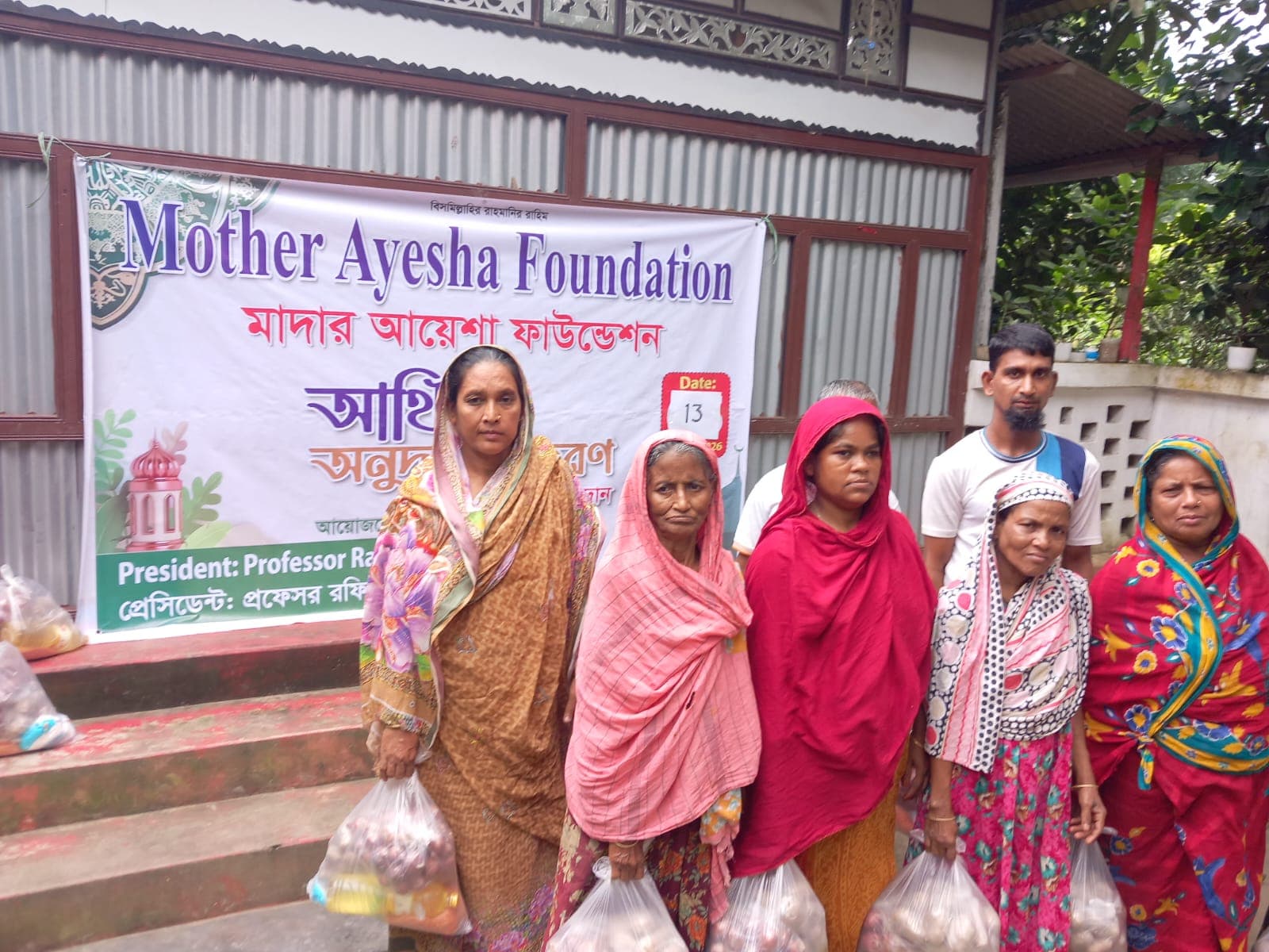 Mother Ayesha Foundation assistance distribution event with beneficiaries and food packages